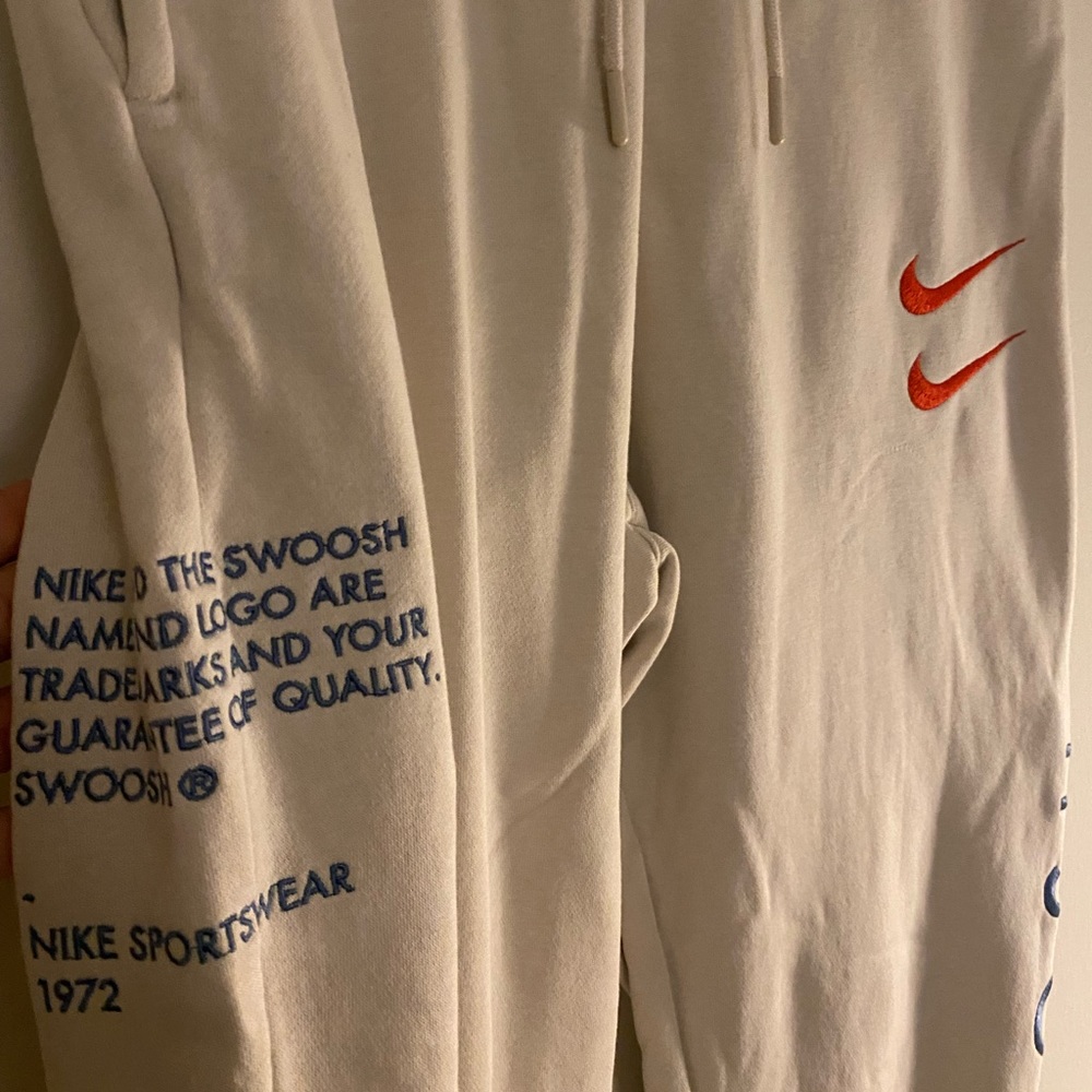 nike pants (swoosh)